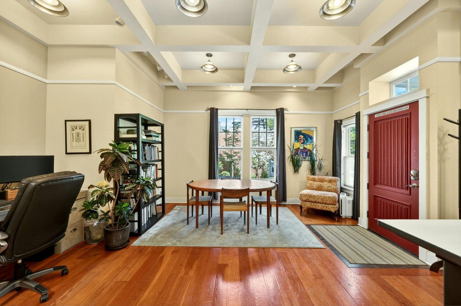 The first floor front unit faces South Oregon Street & is currently used as an office
