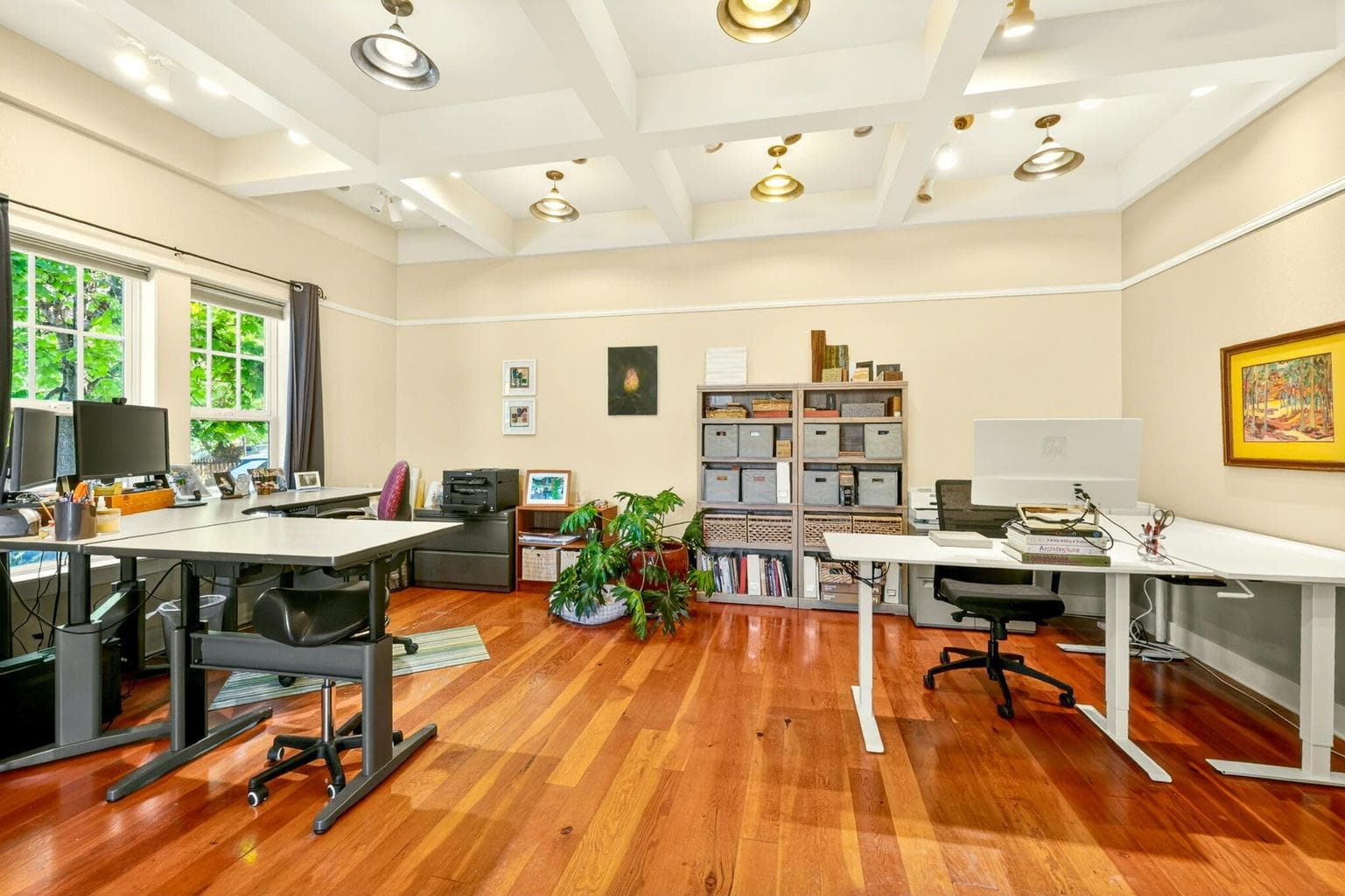 The front unit has high ceilings, abundant natural light & fir flooring