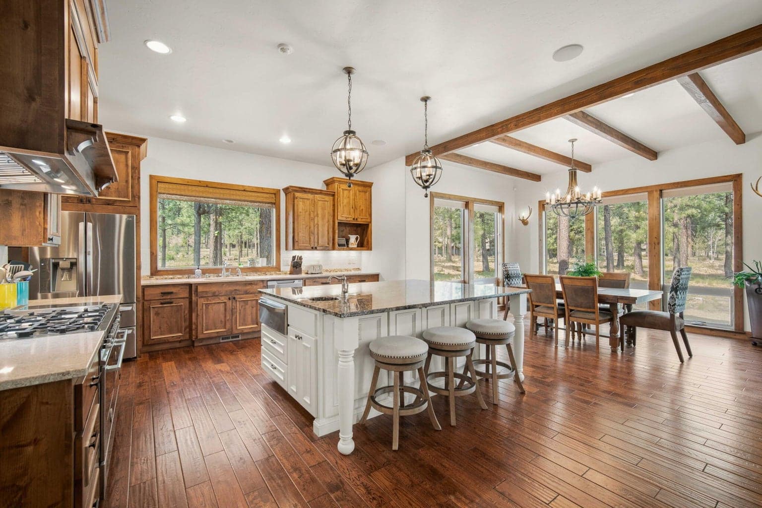 Open kitchen with high end appliances and beautiful views.