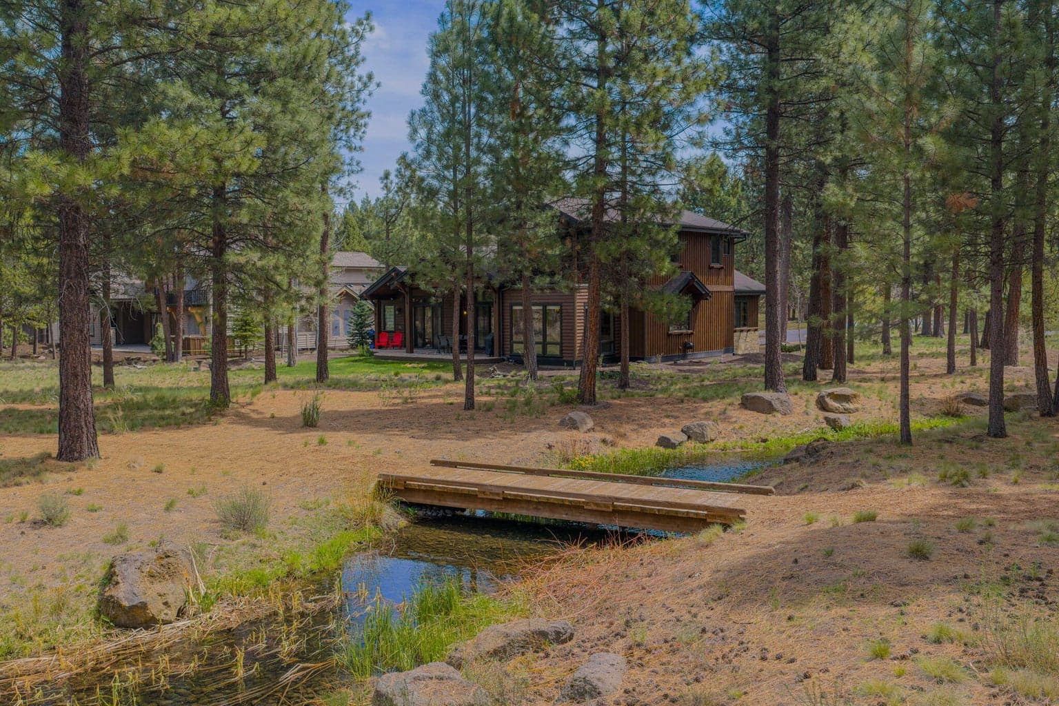 Bridge and walking path to and around the lake. Steps from your backdoor!
