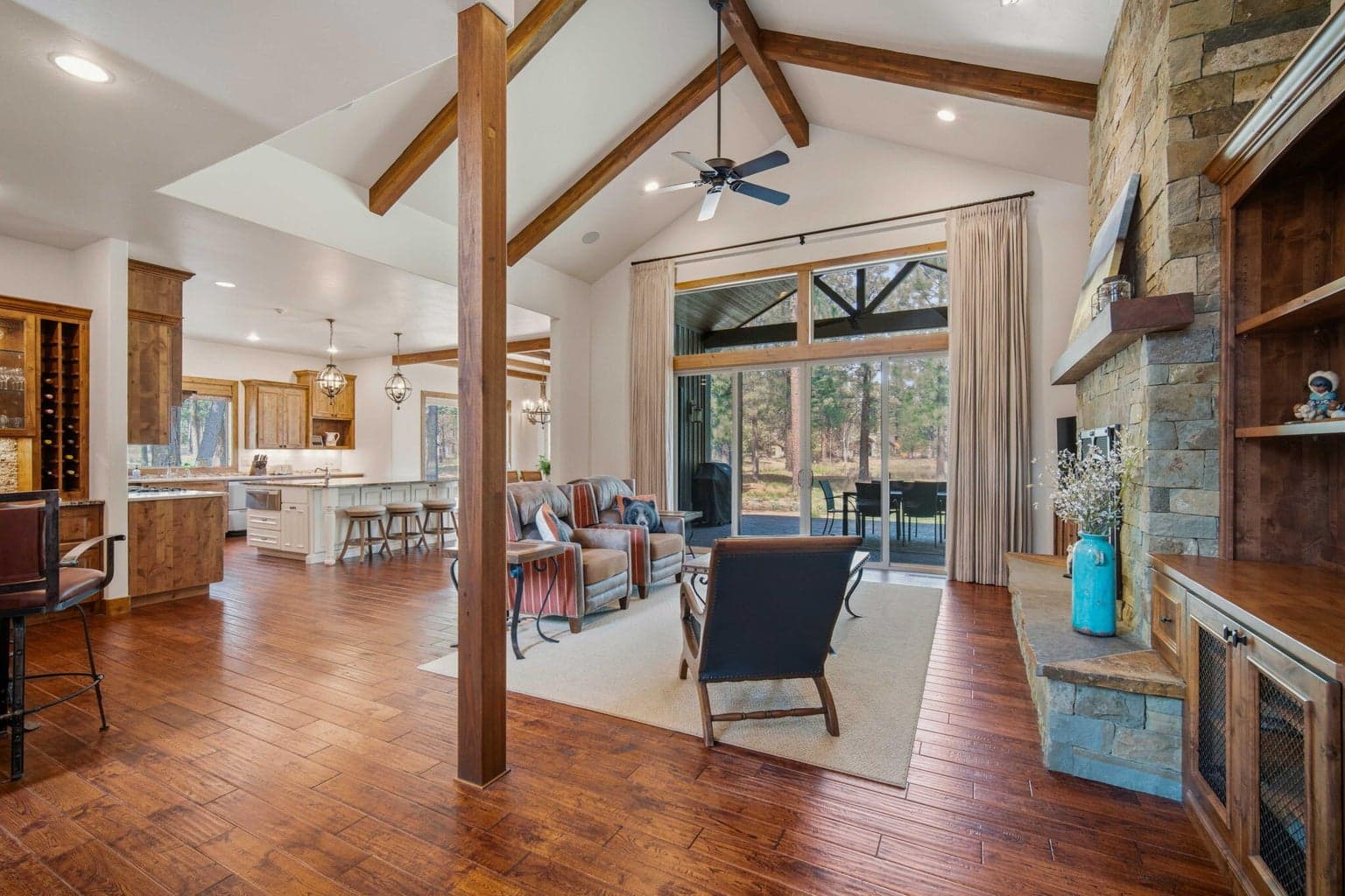 Entry with vaulted ceiling and wood beams.