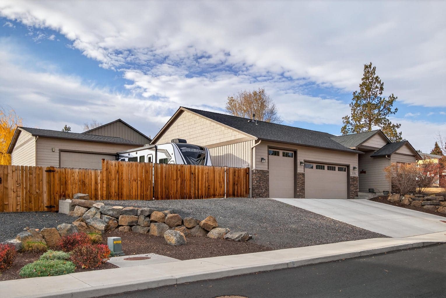 Custom shop, RV parking, extra tall 3rd bay garage