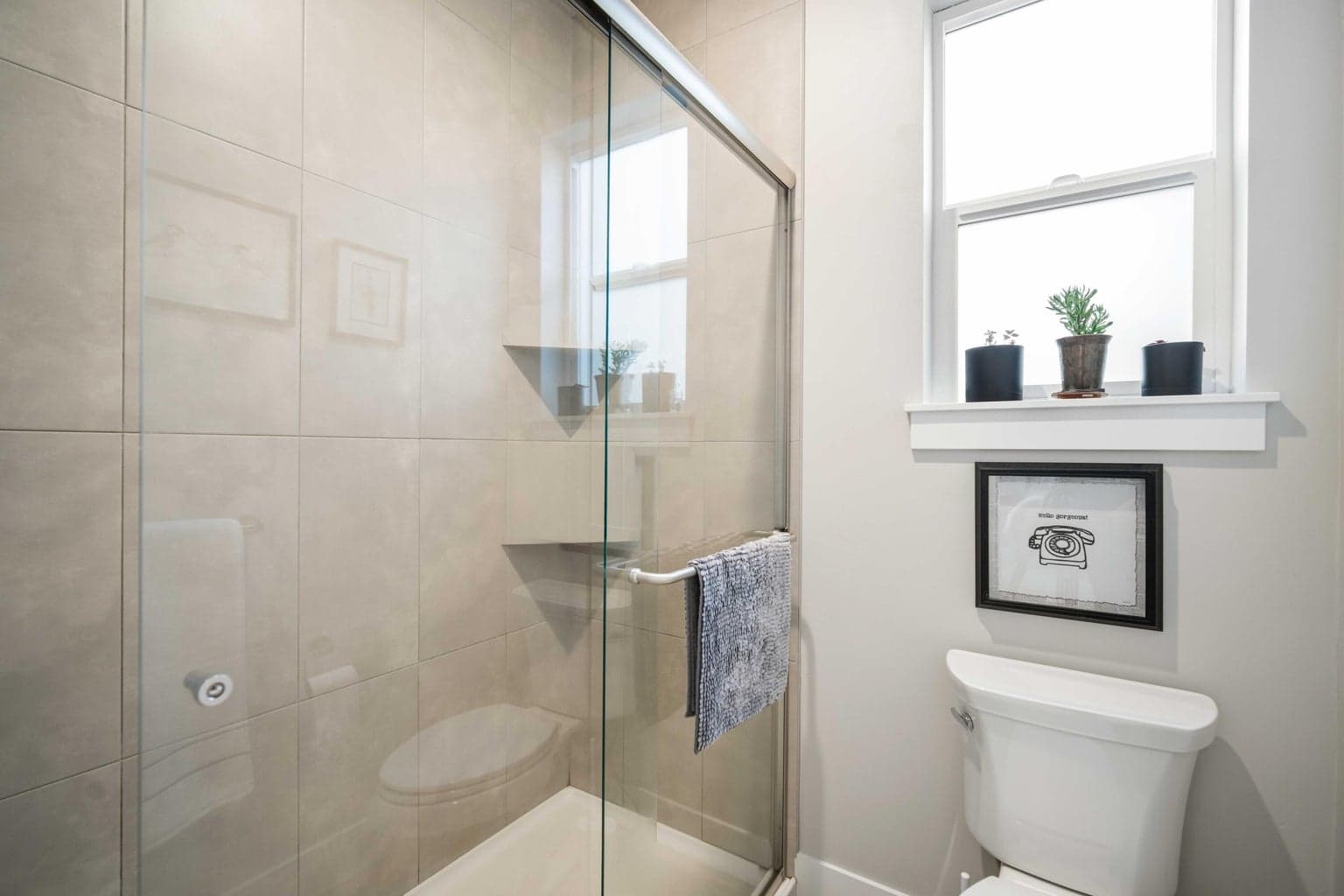 Primary - Tile shower with glass