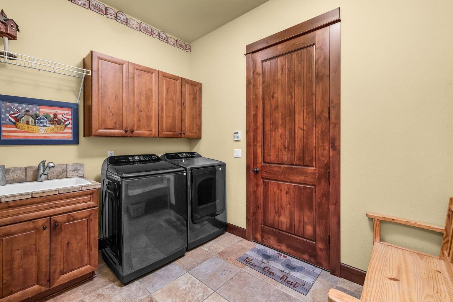 Laundry room with built in sink.