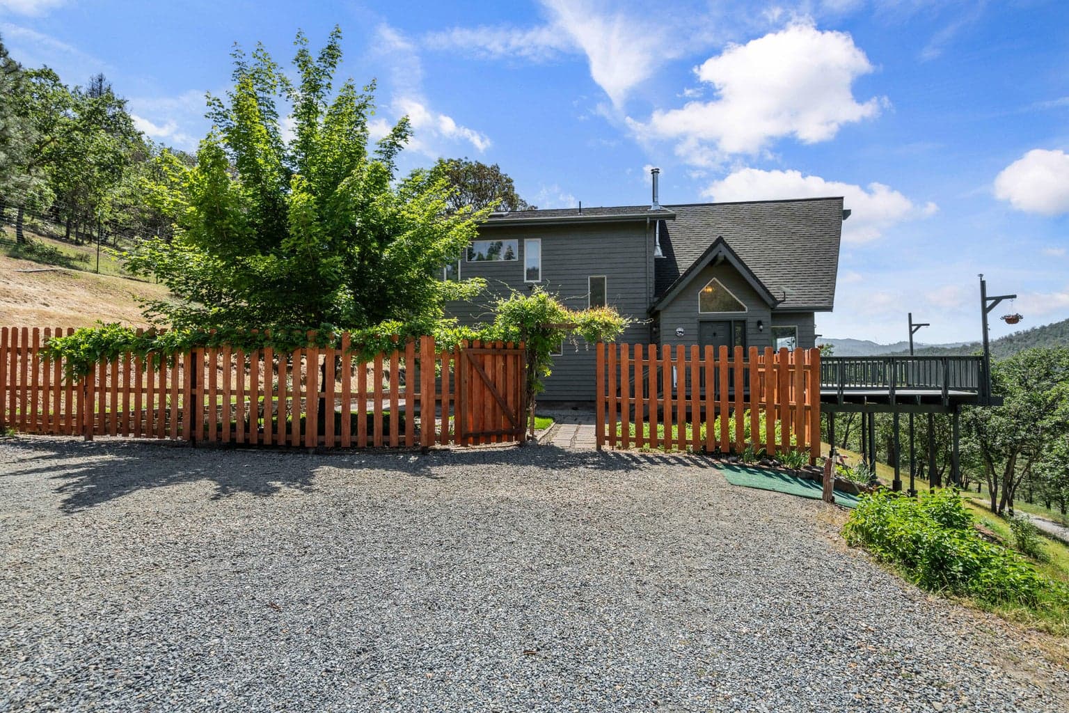 Fenced entry for main home