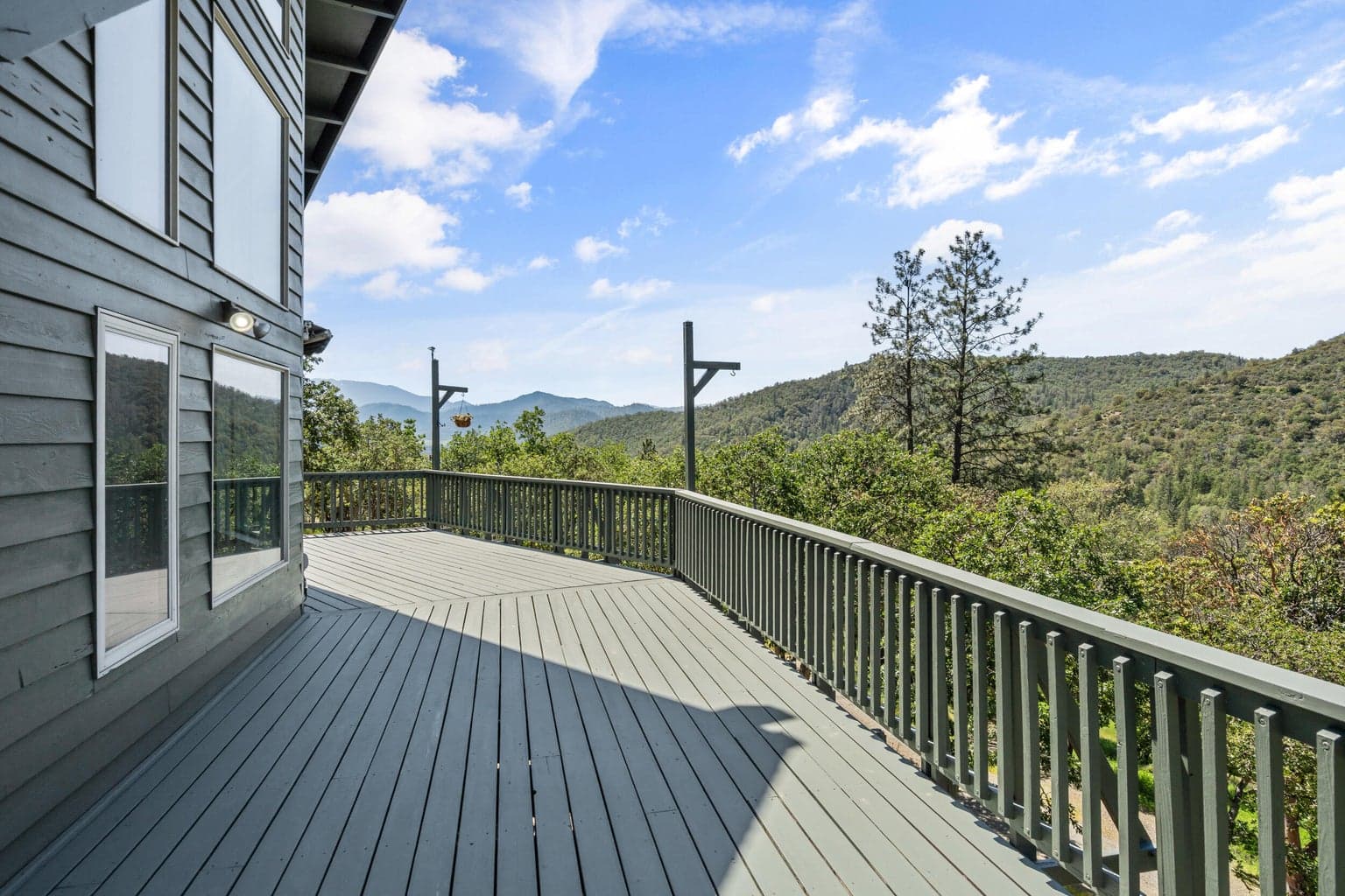 Wrap around deck facing acreage from main home