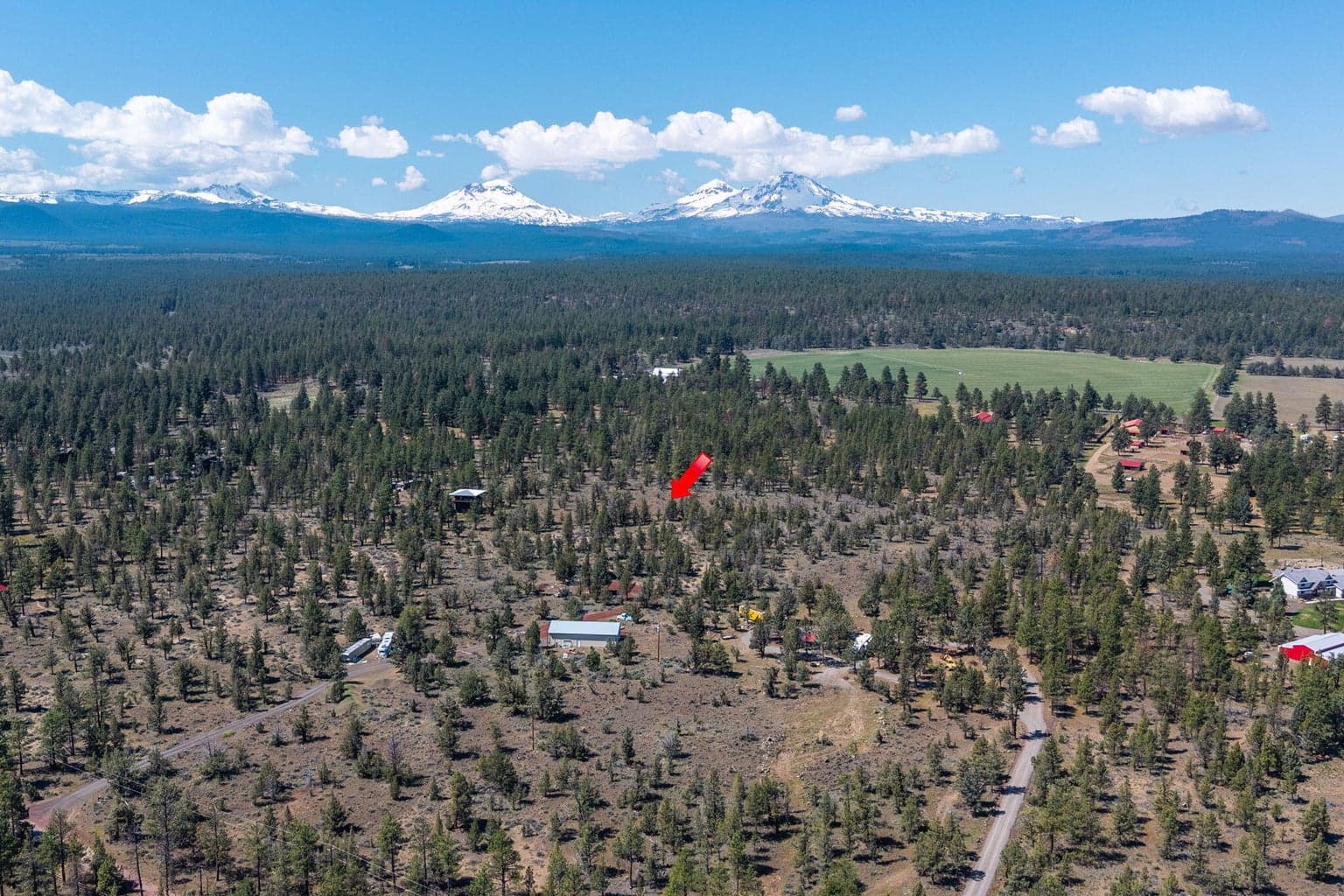 Arrow pointing to approximate property center.