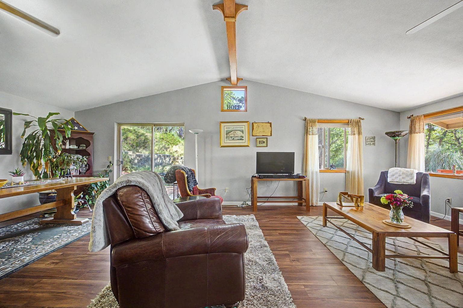 Main House Living Room w/ vaulted ceiling