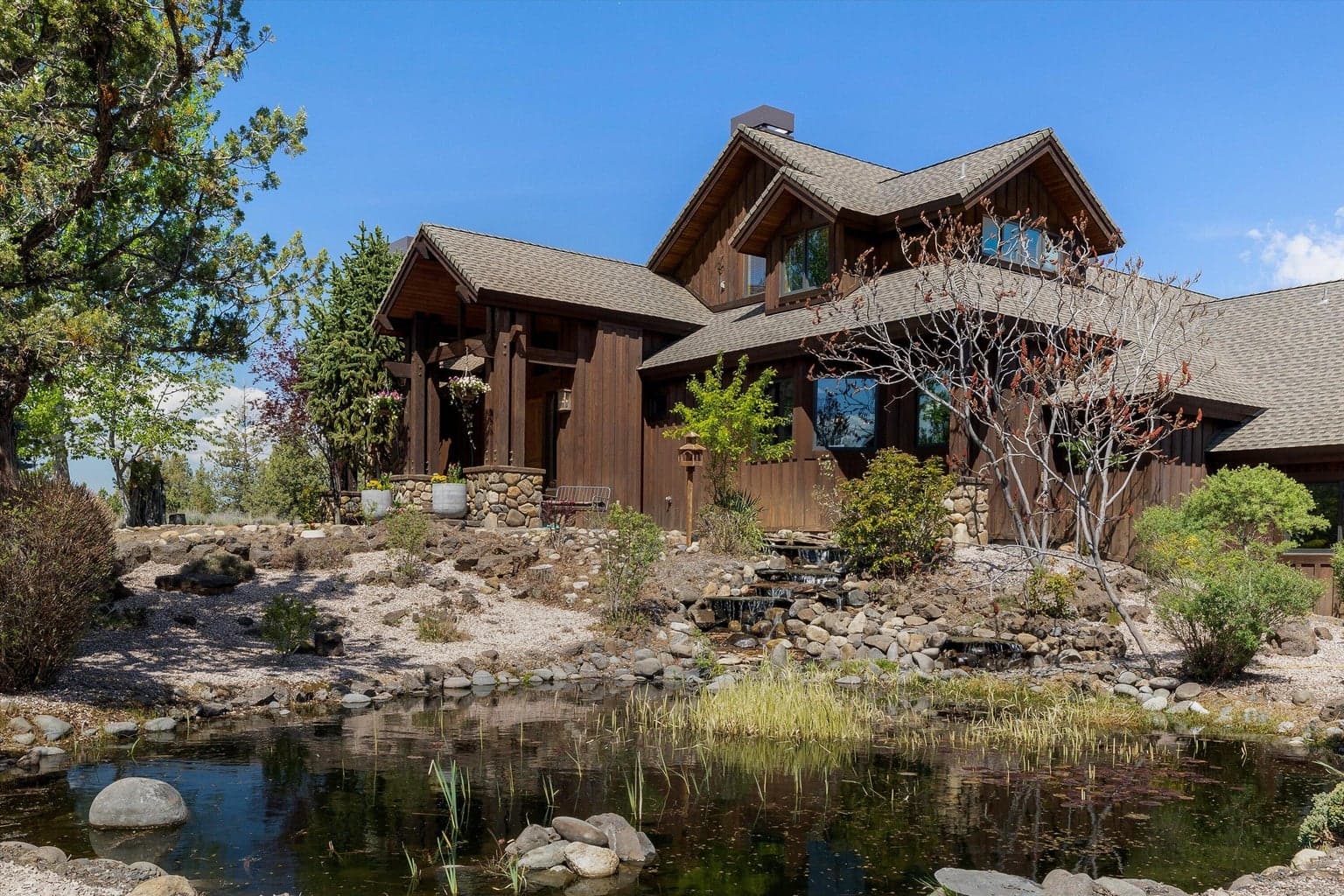 Stunning entry with gorgeous pond and waterfall.