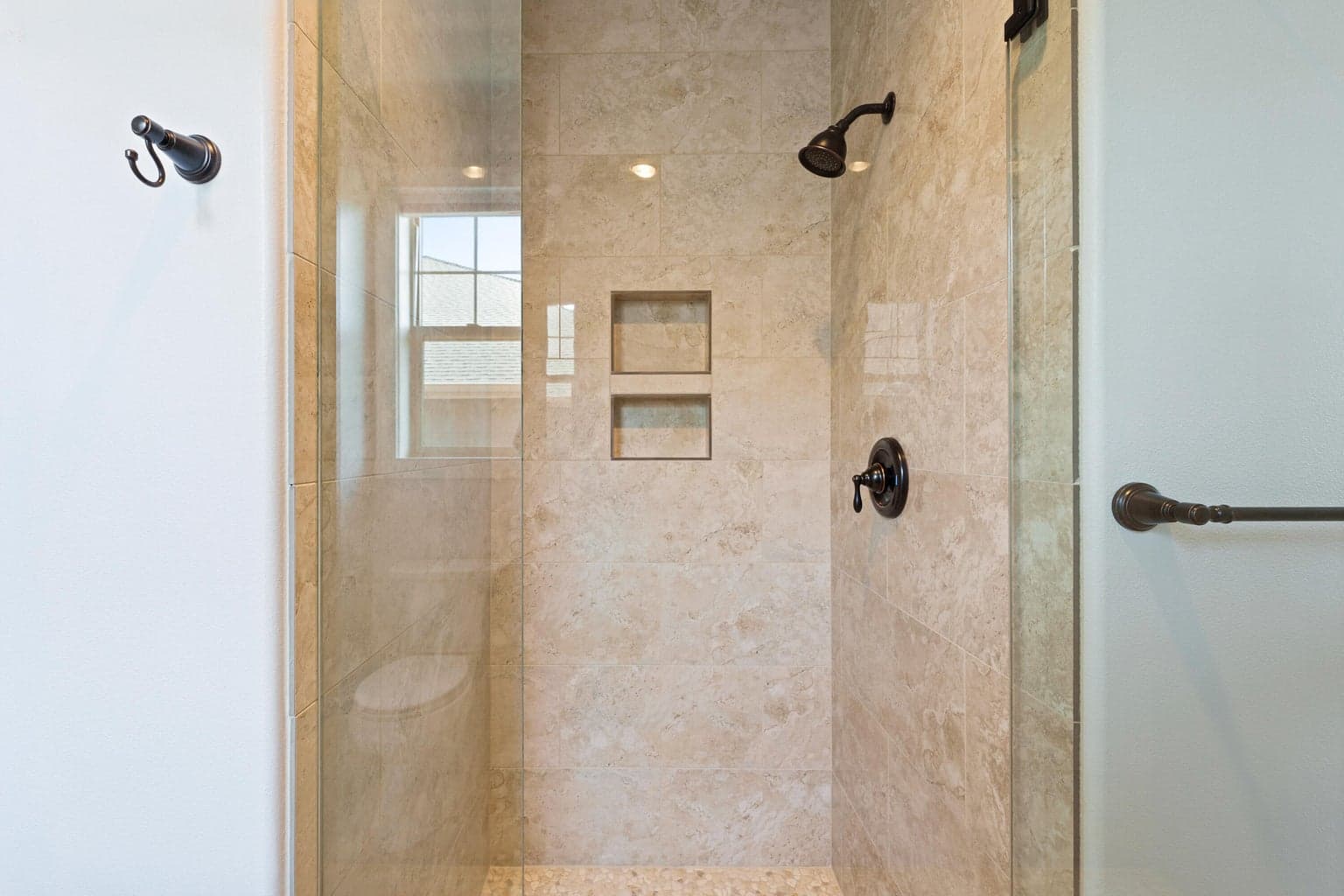 Walk in tile shower.