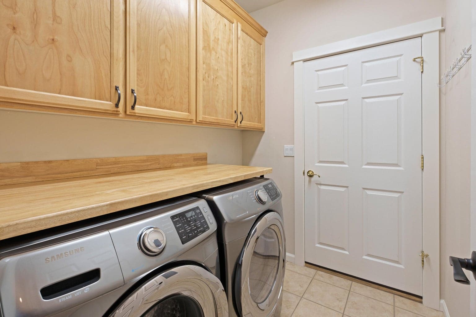 Laundry room with lots of storage.