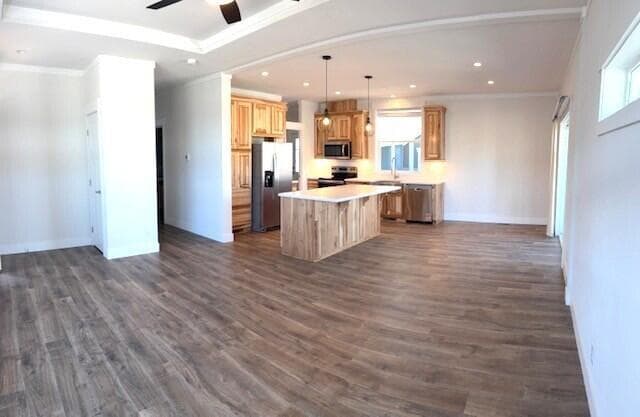 Living area, kitchen, dining & luxury vinyl plank flooring.