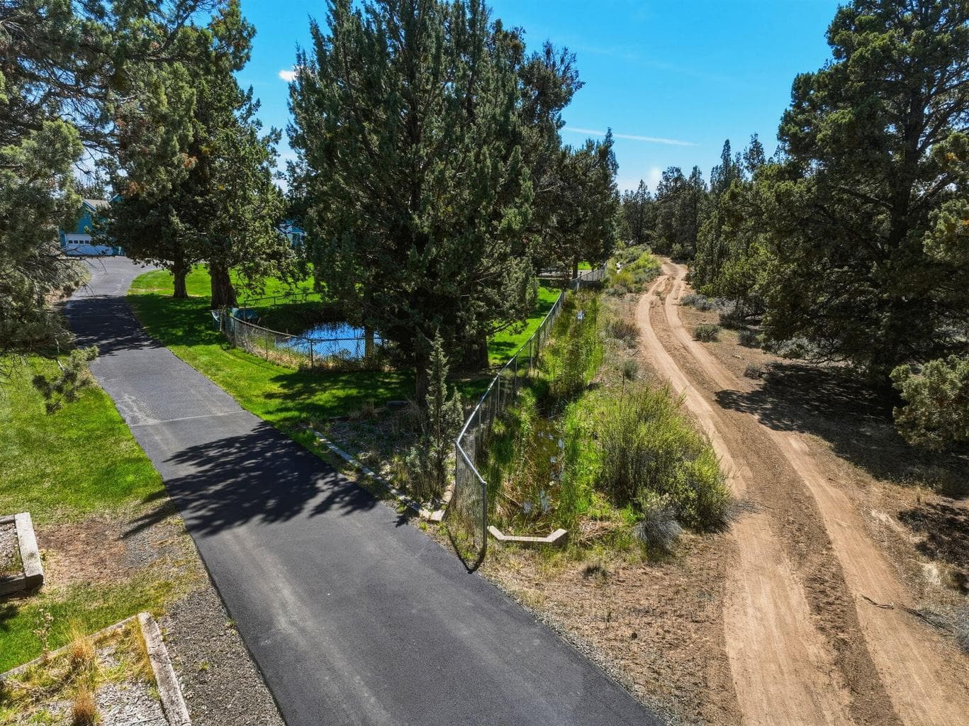 Main driveway with COID easement road to canal
