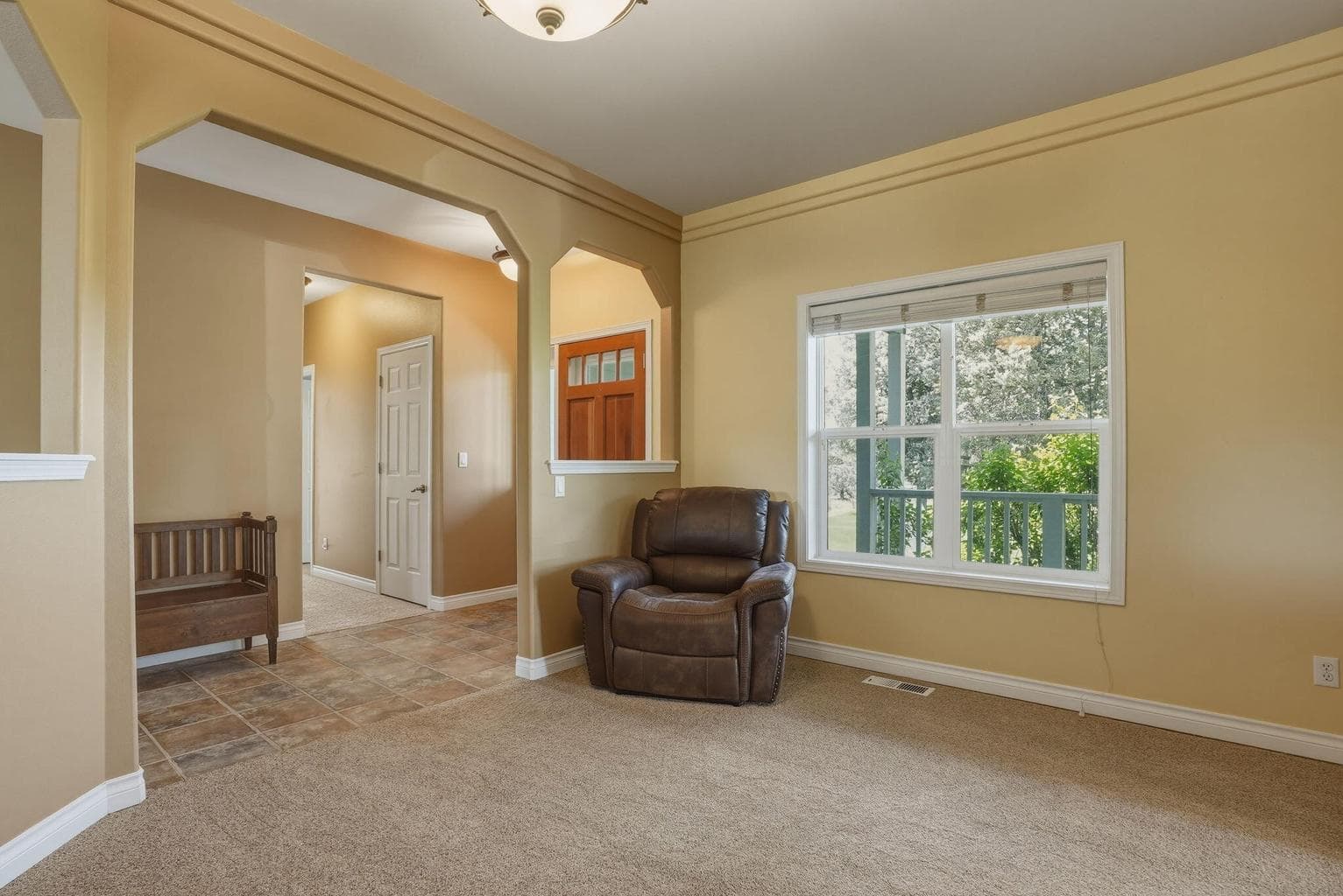 Front entrance with formal dining room
