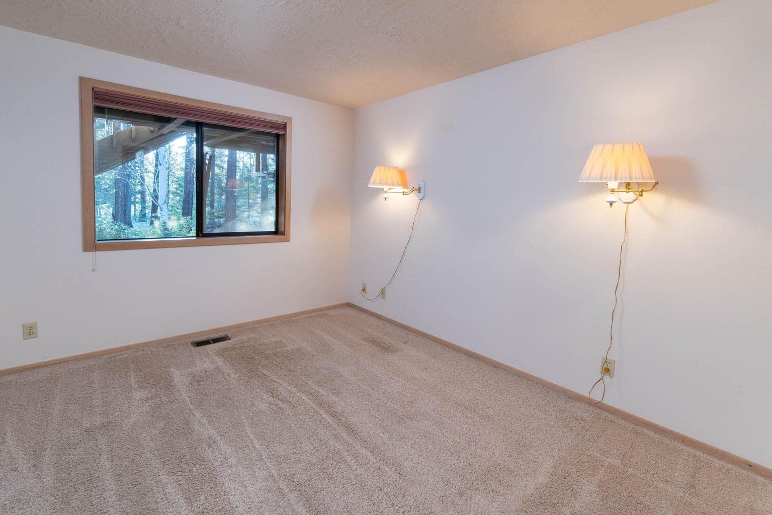 3rd primary ensuite downstairs w/lovely light & views to the backyard's mature landscaping & easy access to the central 2nd living room space, access to the lower deck/hot tub & backyard.