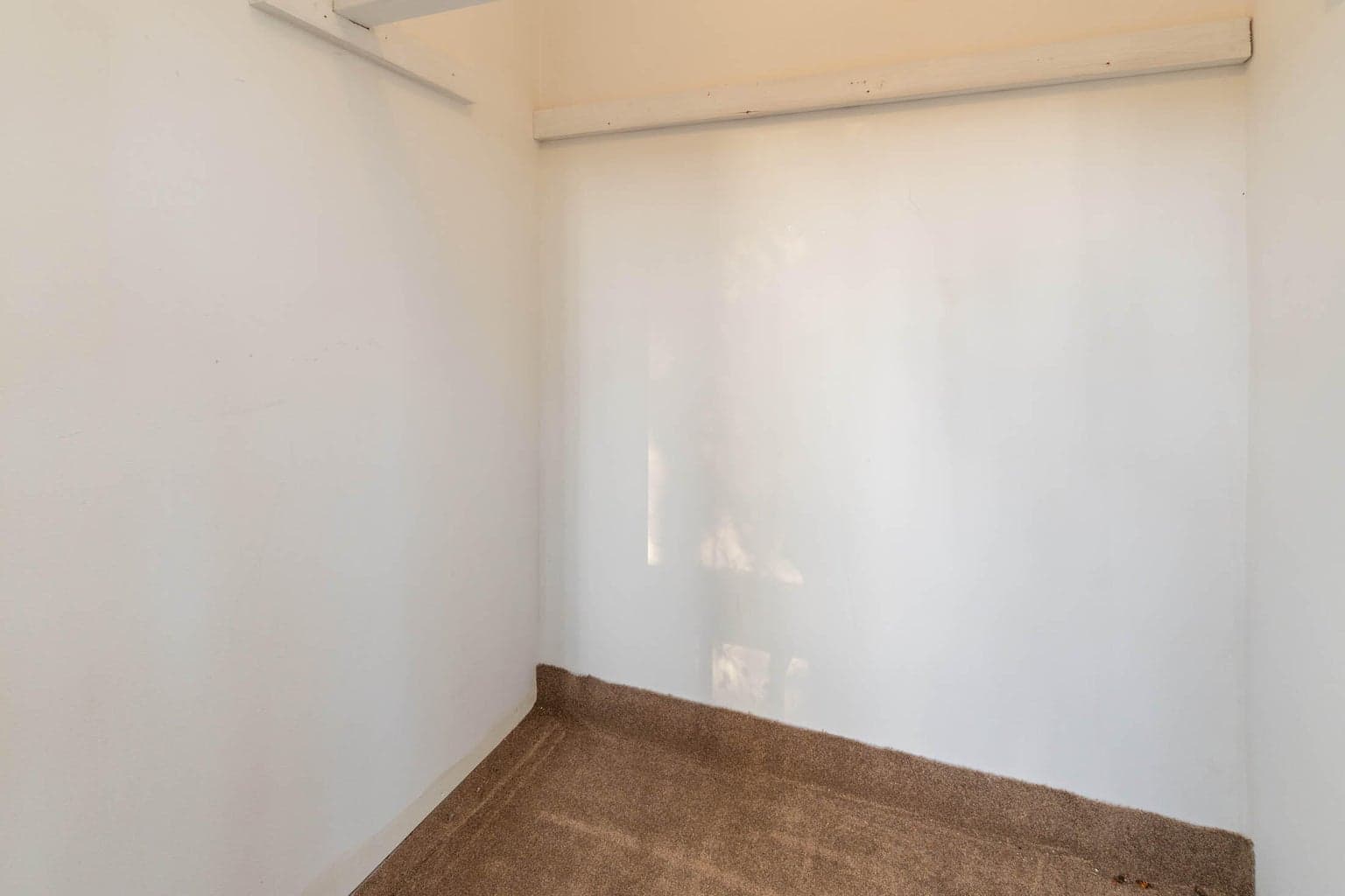 This is the upstairs storage room that backs to the 1st primary/ensuite 's closeted area. Could store your outdoor furniture or become your sauna upstairs!
