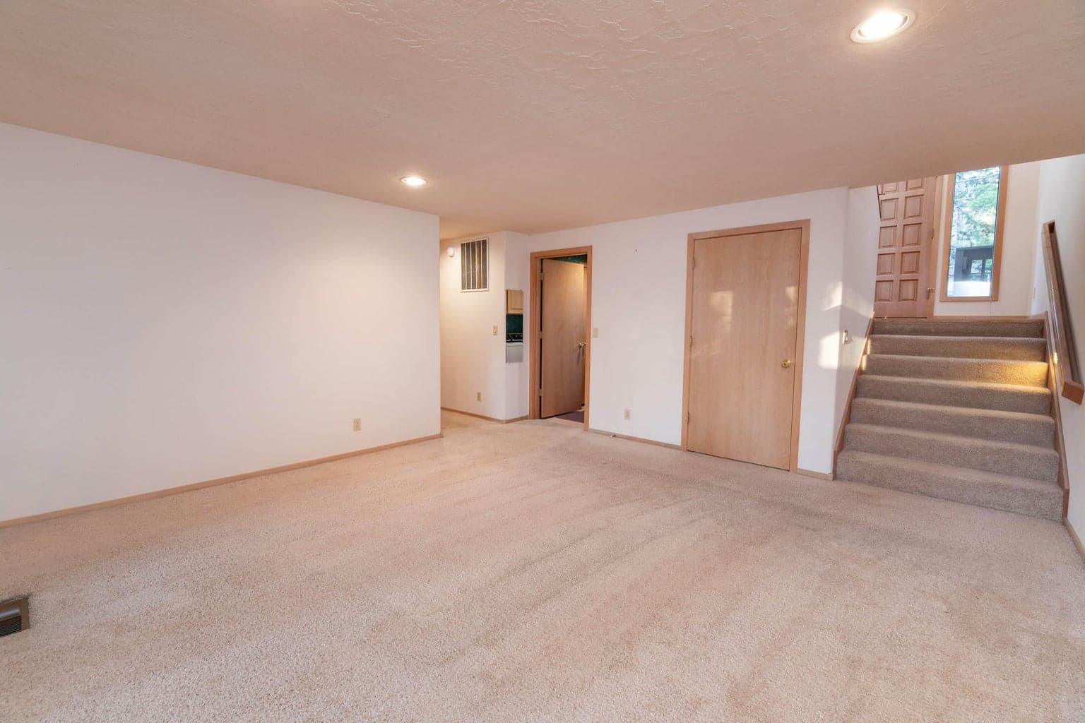 Another view of the 2nd living space downstairs, which is central to the 2nd and 3rd junior primary ensuites for an excellent separation of space between guest quarters!
