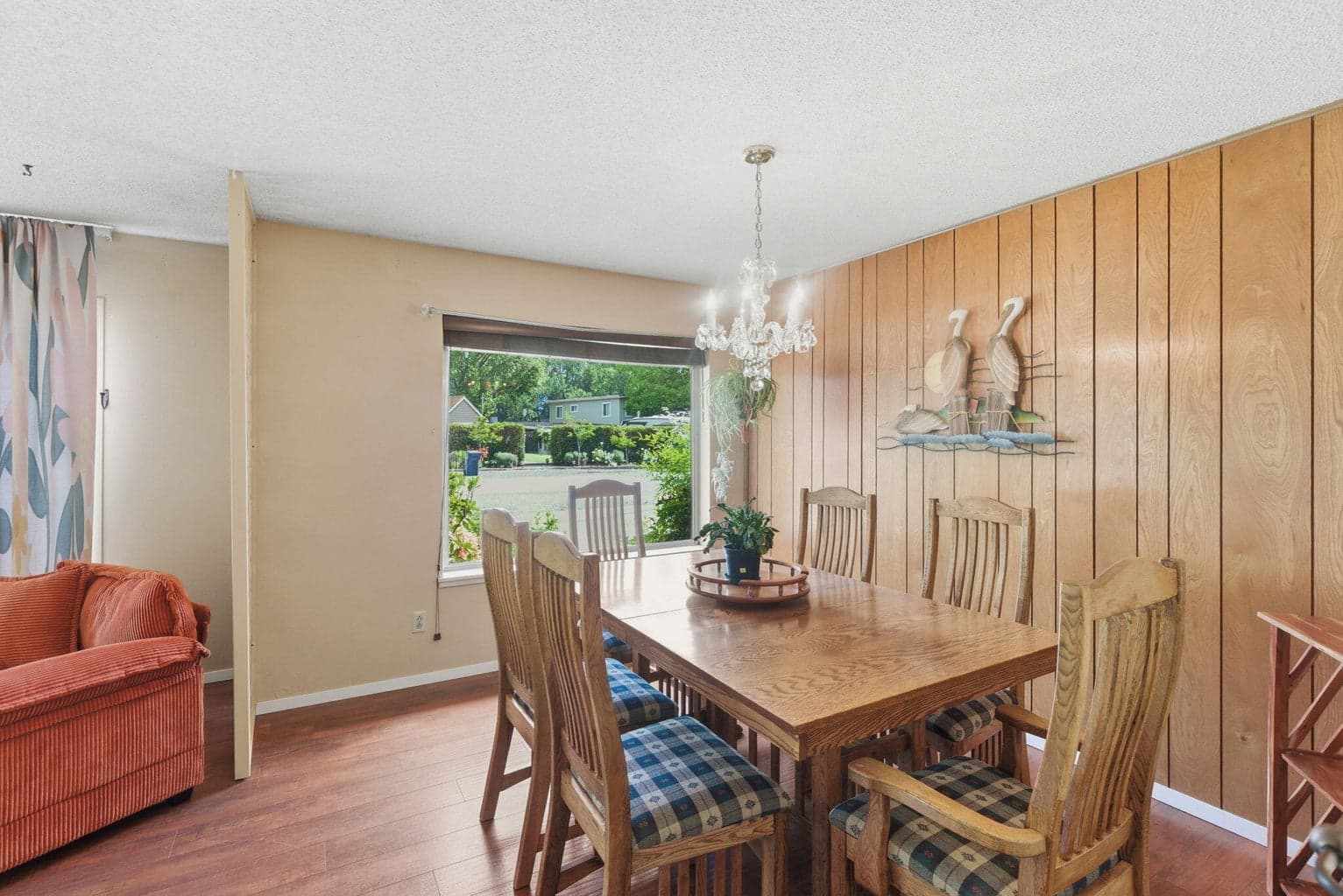 Lovely dining area with large window and ample natural light.