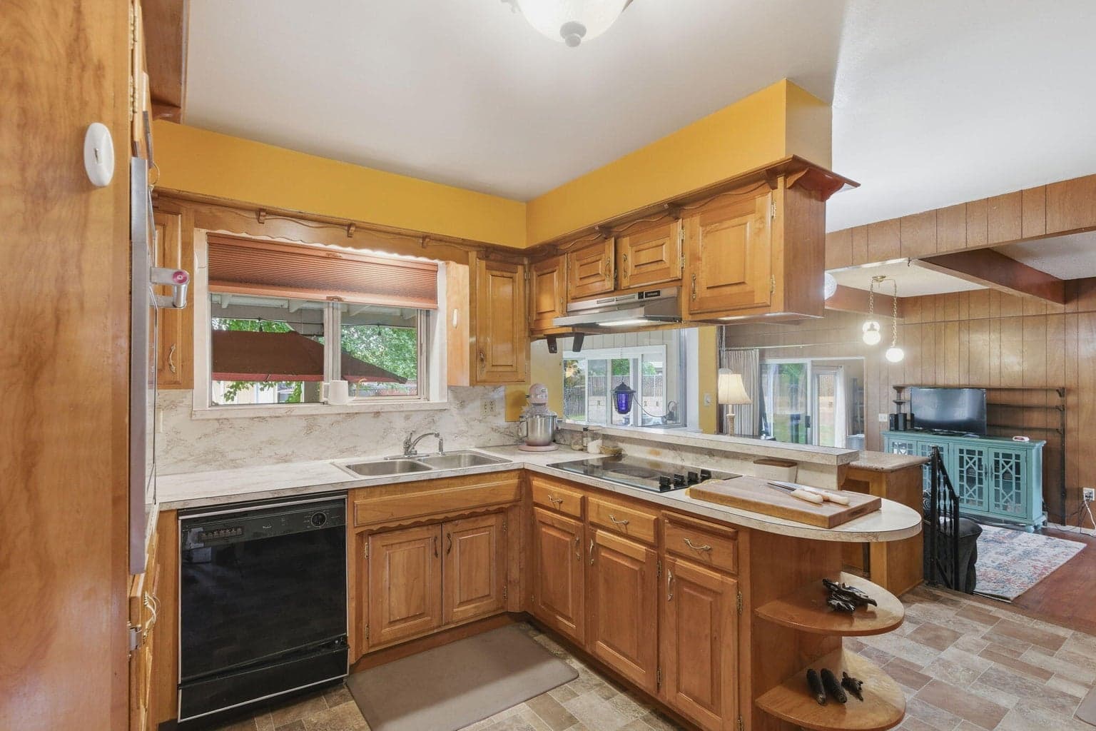 Kitchen with dining nook. Ample space to do anything with.