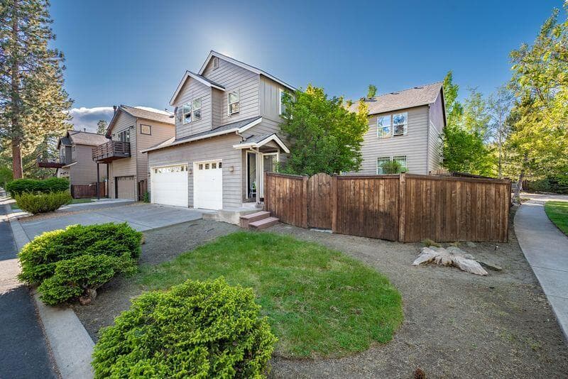 Corner lot with alley access to the garages.