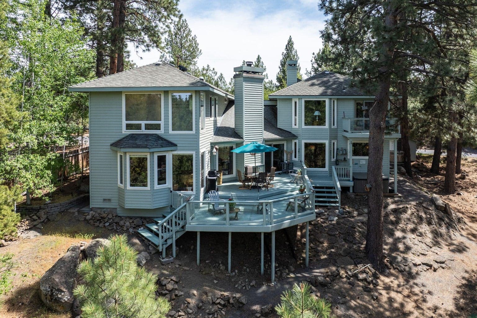 Deck viewed from trees by river