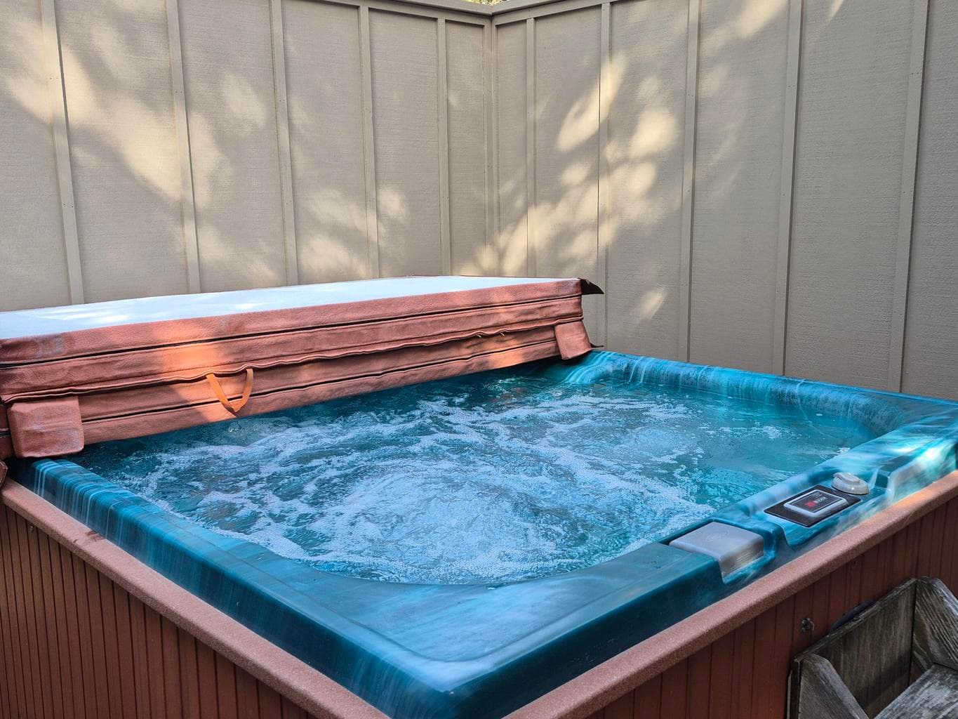 Fully enclosed hot tub on back deck