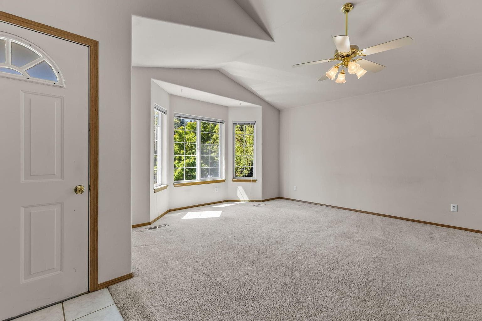 Vaulted main living area filled w/natural light.