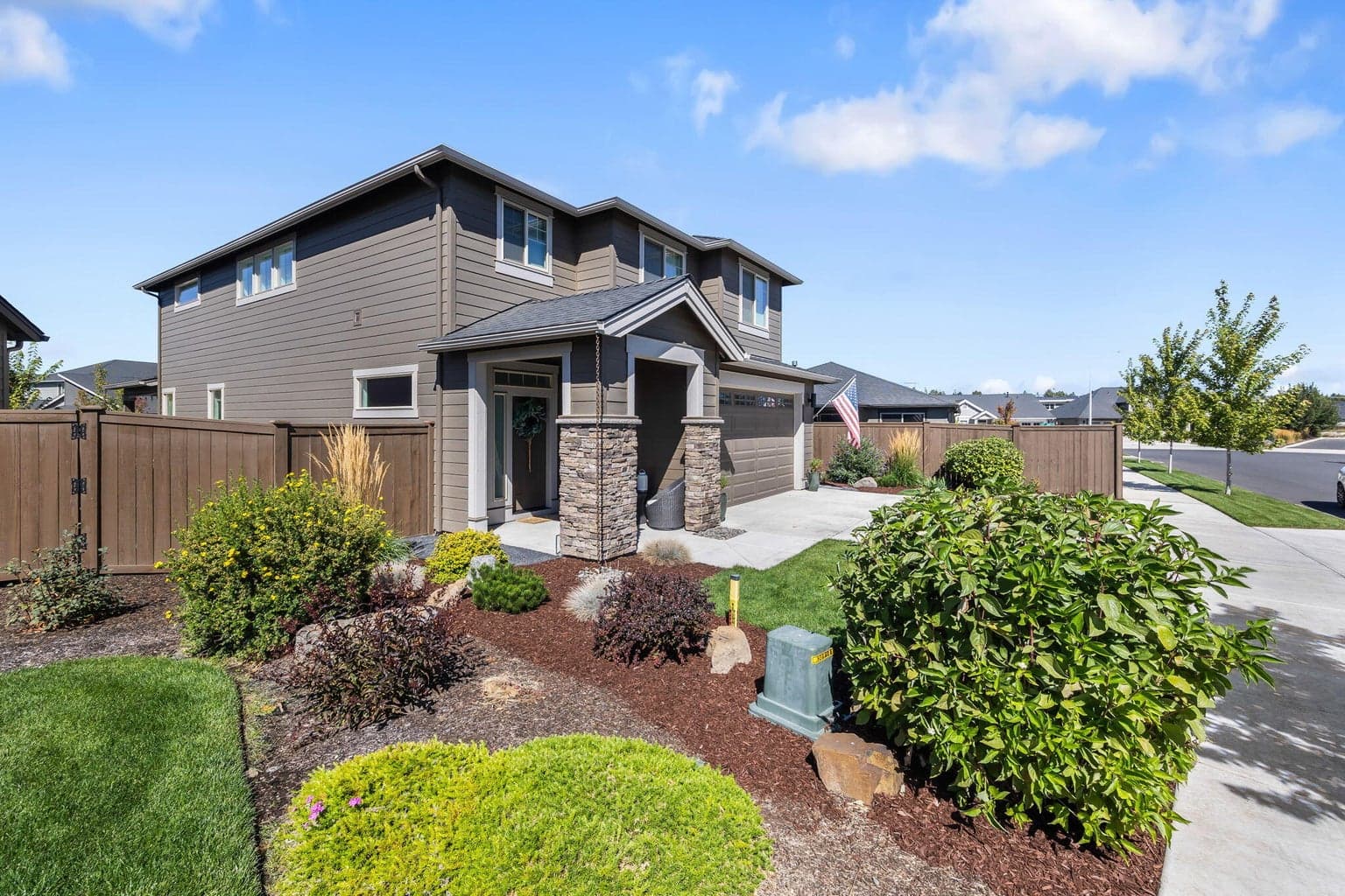 Elevated curb appeal paired w/HOA maintained front yard & outdoor adventure nearby.