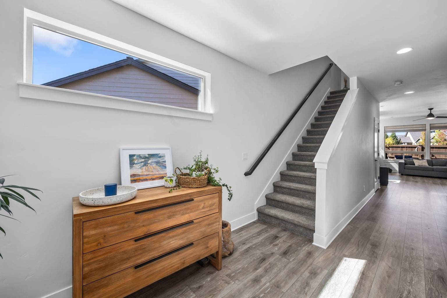Natural light fills this inviting main living space.