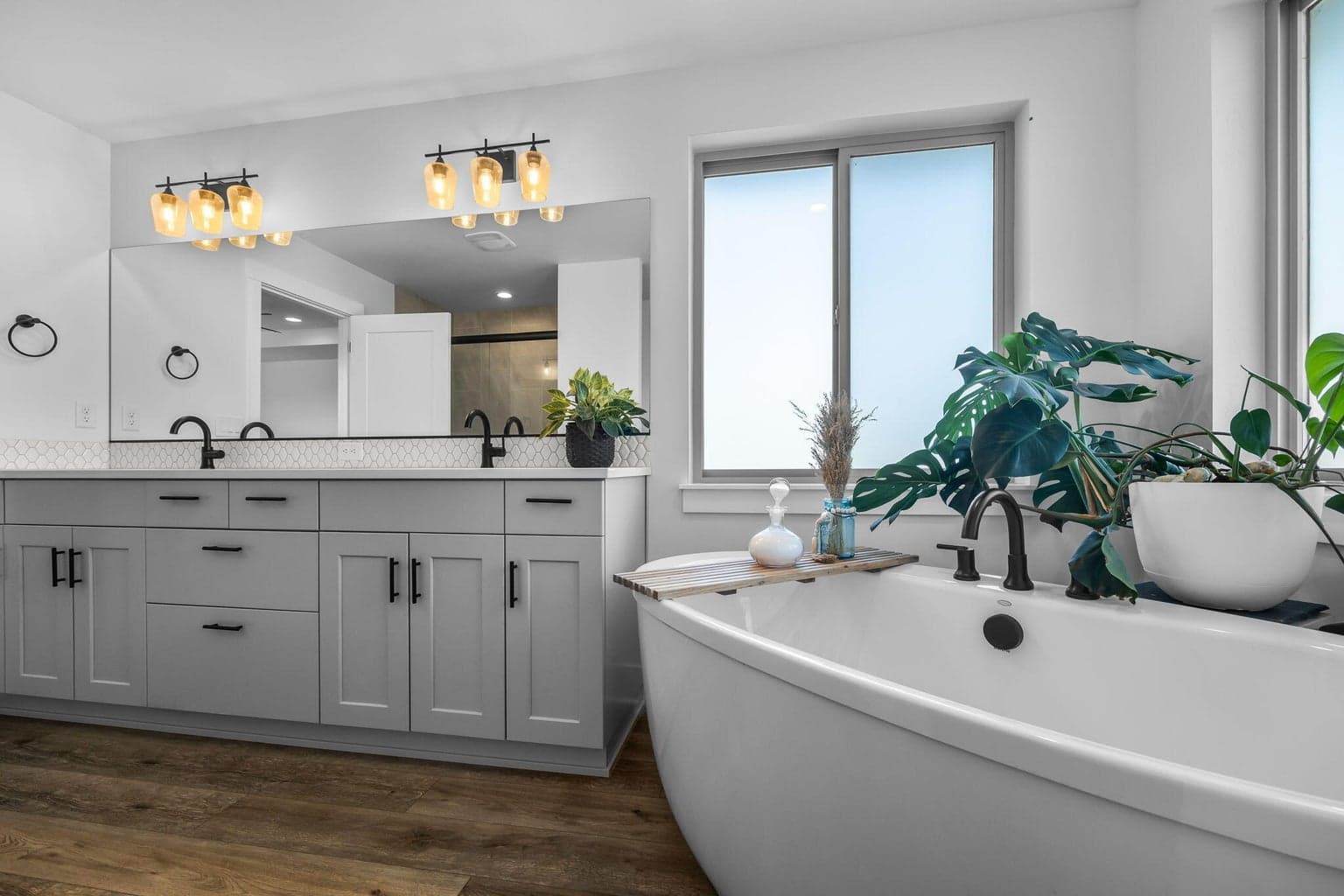 Quartz Counters & dual vanities, generous walk in closet also.