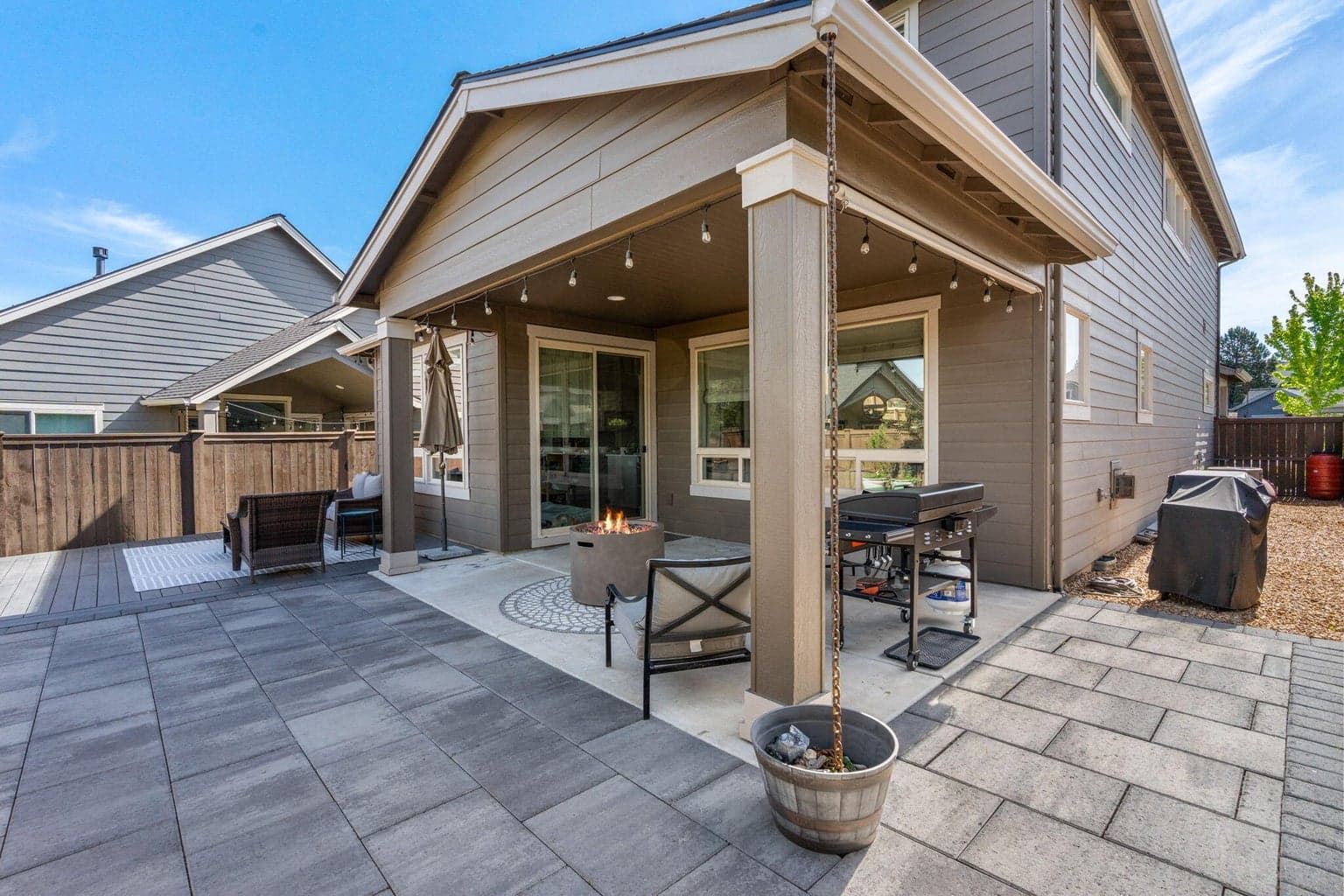 Covered patio & Trex deck create year-round outdoor living.