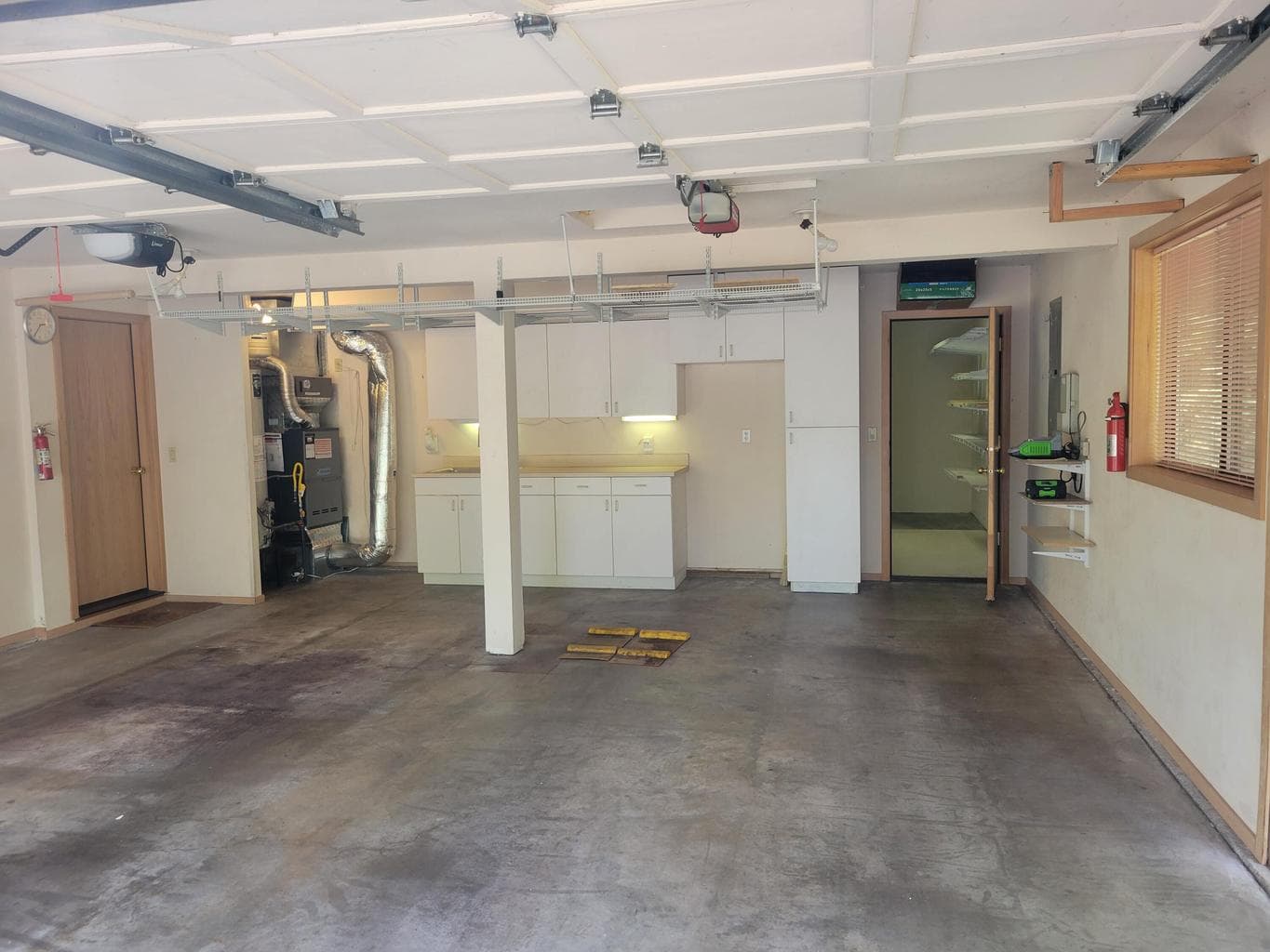 To the right you can see the locked room that serves as a "Gear garage" for your ski clothes/skis, and/or wine cellar or cold storage pantry.