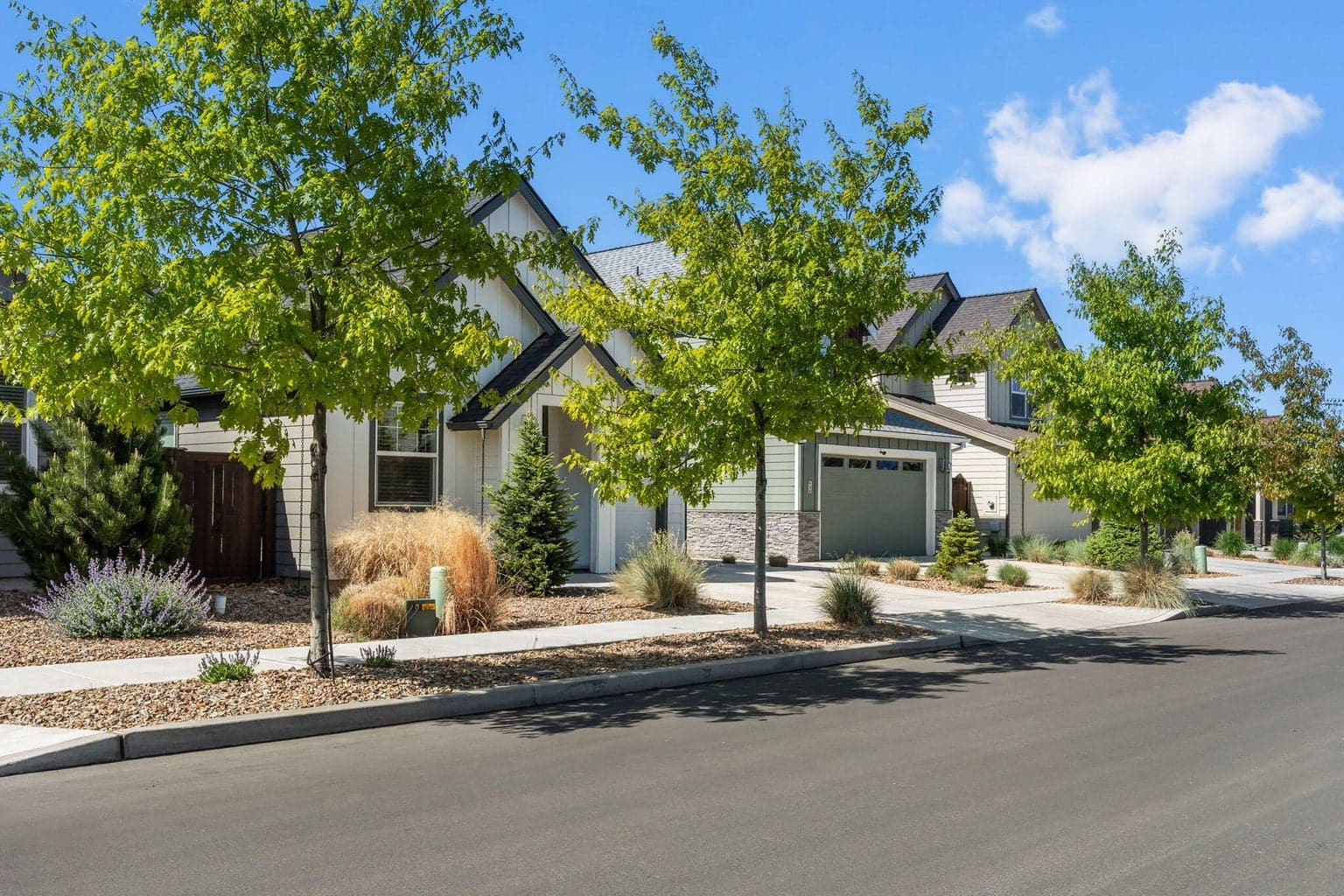 Cascade views & curb appeal in sought-after Prairie Crossing.