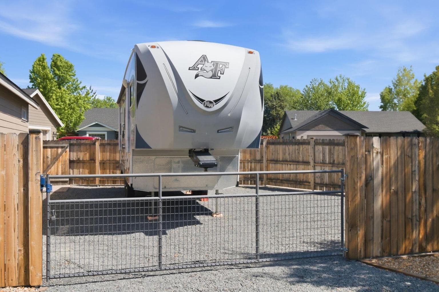 Park an RV and a boat on one side and use the sewer clean out for your camper.