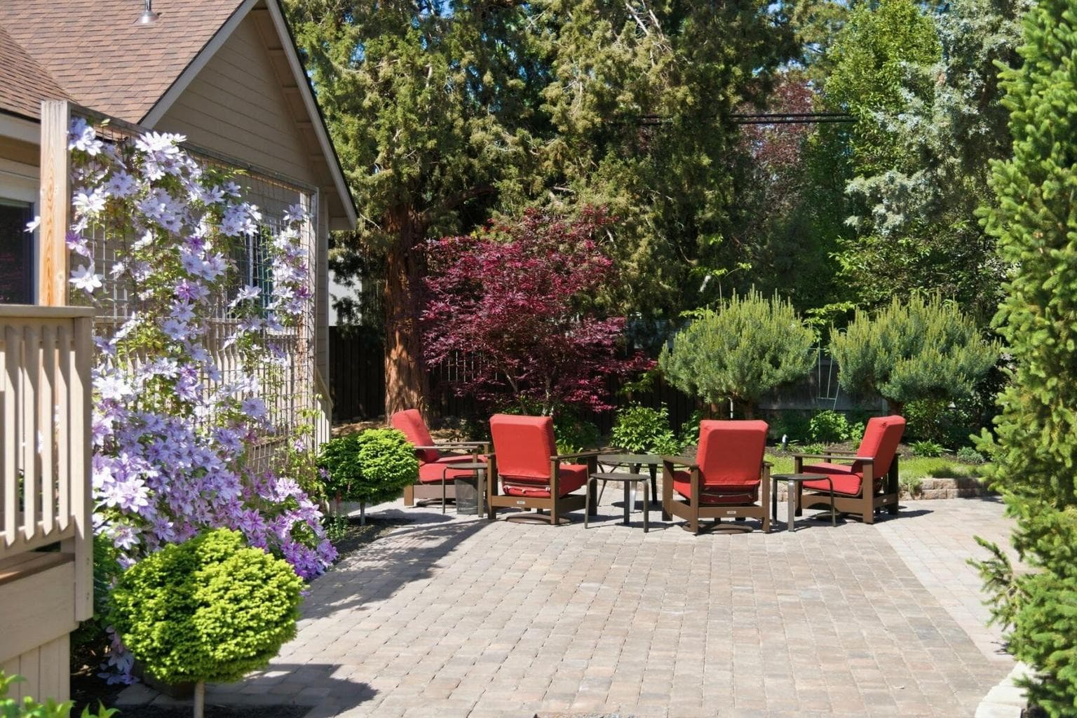 The outdoor space is perfect for entertaining with drip system irrigation.