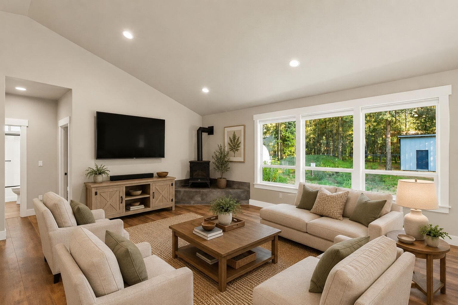 Hallway with built-in storage and access to bedrooms. Note this is virtually staged