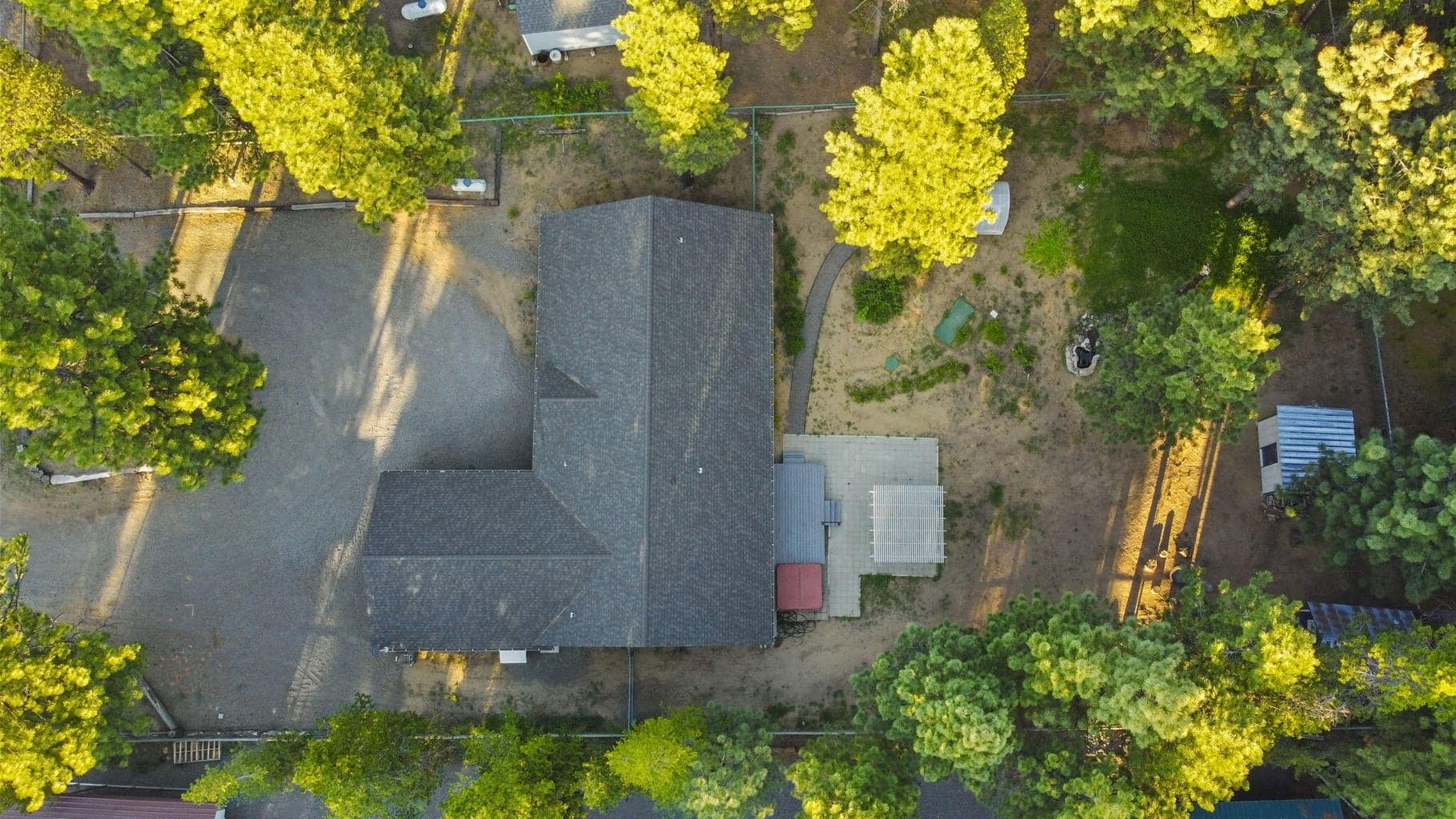 Drone aerial, property overview, fenced lot, Three Rivers South