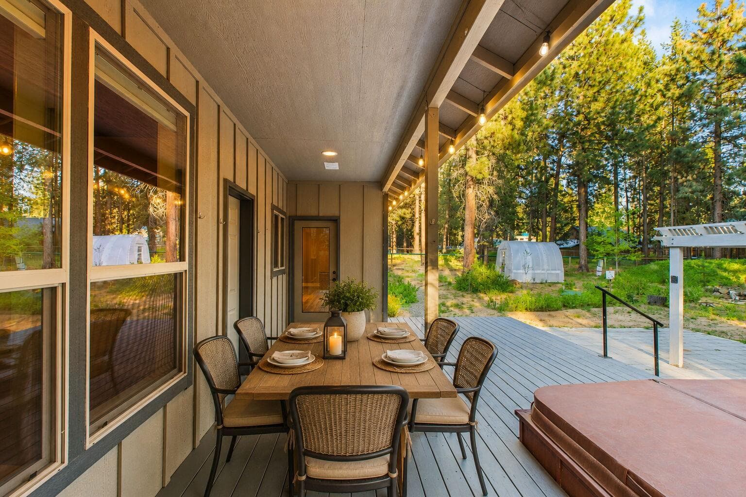 Outdoor dining, covered deck, entertaining space, lifestyle living.
