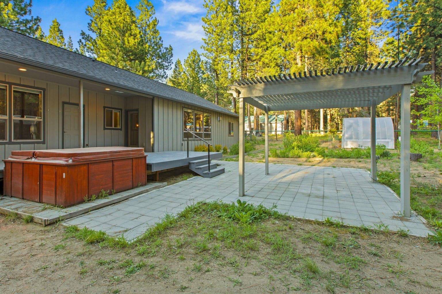 Multiple outdoor spaces create opportunities for entertaining and relaxation.