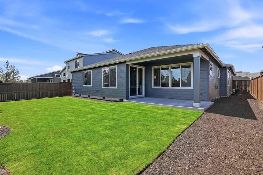 Subject property photo - rear yard landscaping and trees included!