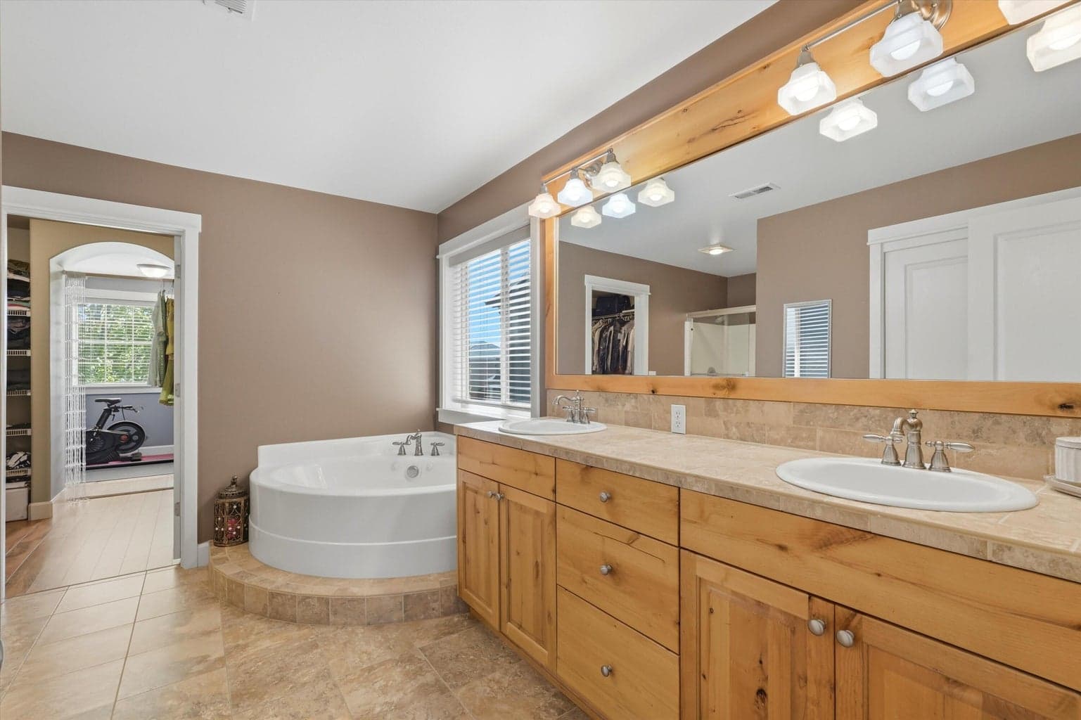 Primary bath with attached walk through closet