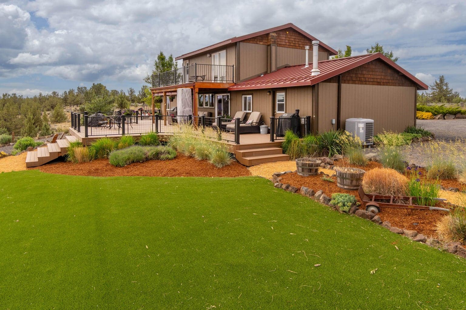 1600 SF rear deck surrounded by mature landscaping