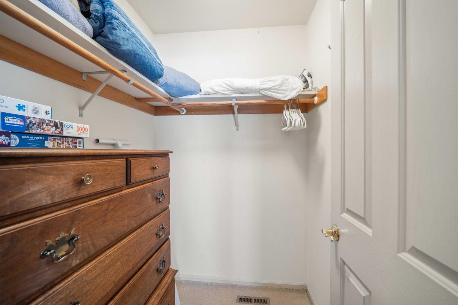 Walk-in closet storage for the bedroom suite, adding practical functionality for vacation or year-round use.