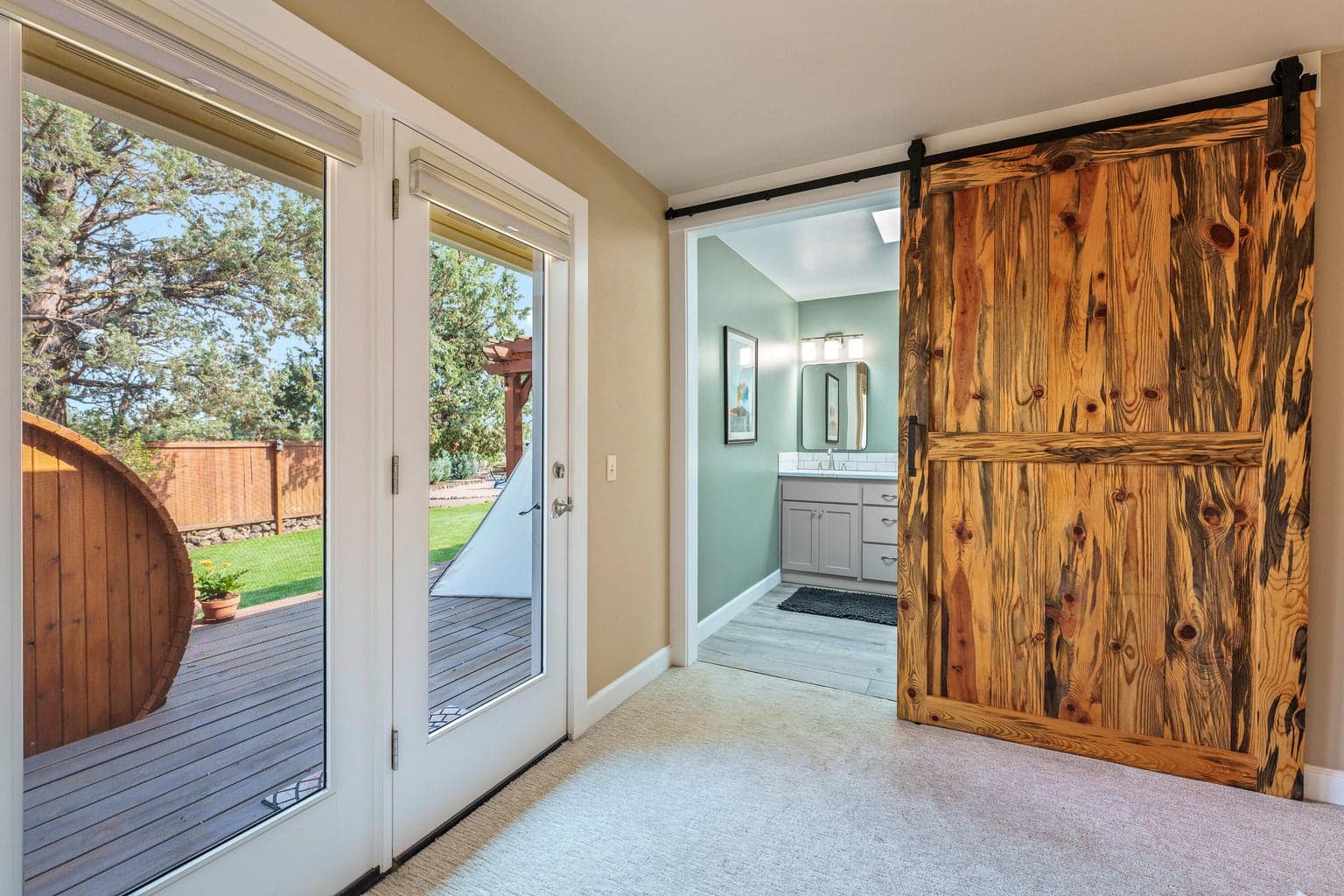 Entrance to rear deck from primary bedroom suite
