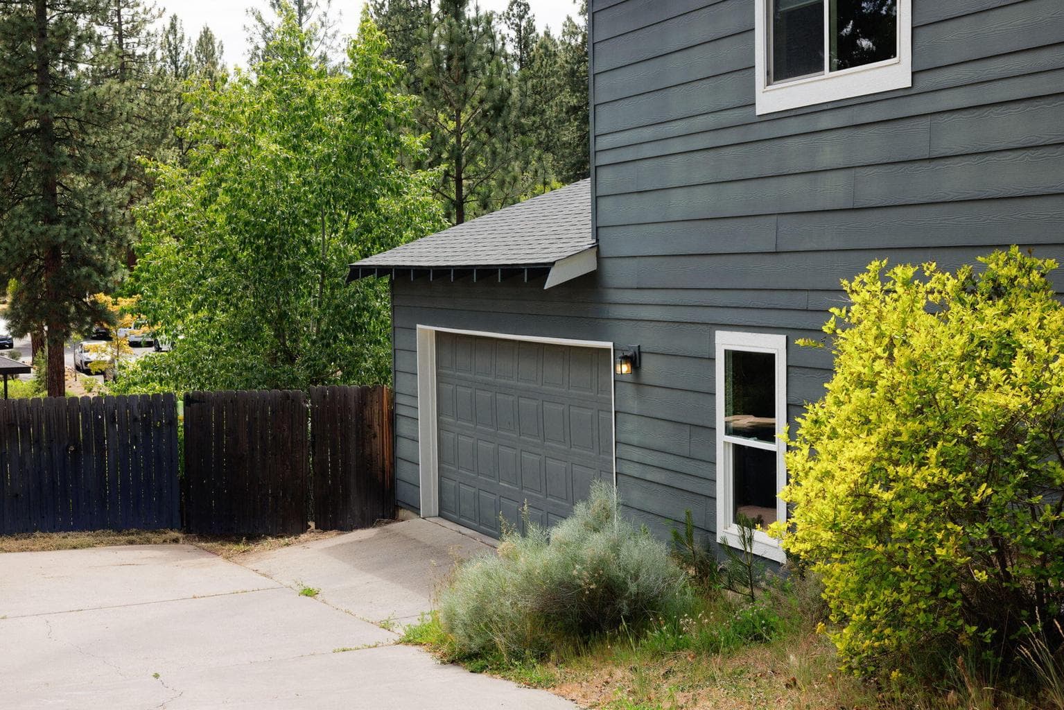 Double car garage with work bench and access to large storage area!