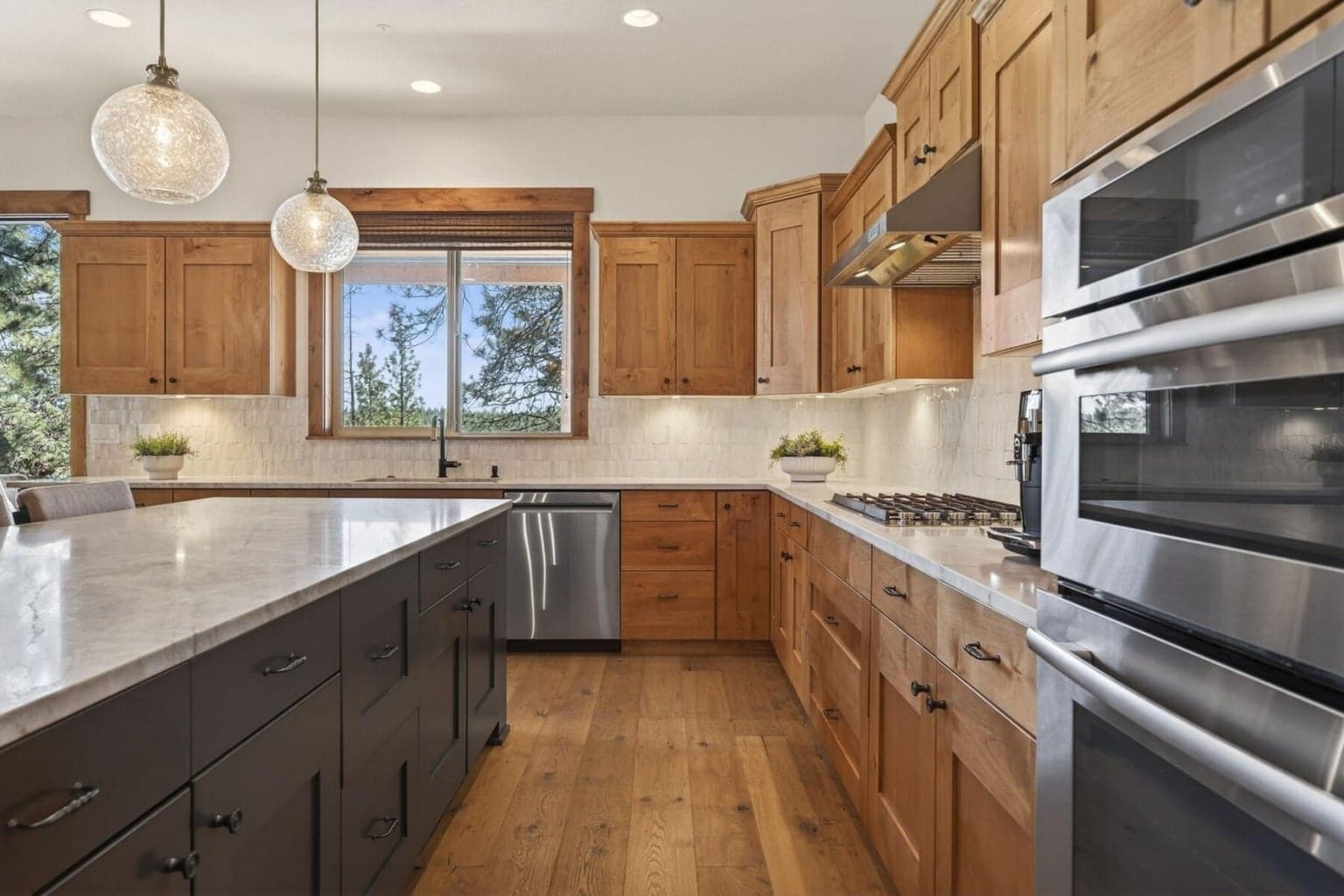 Arteriors Monica Pendants over island