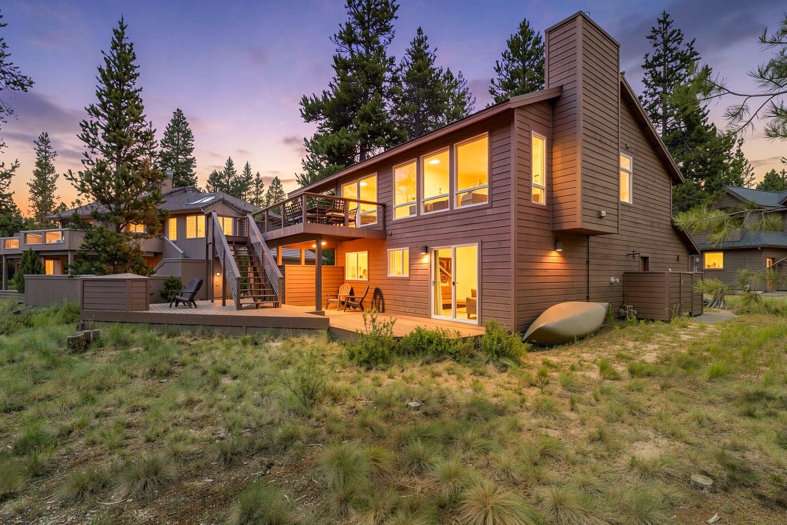 Expansive decks and outdoor living spaces are thoughtfully designed to maximize the stunning natural surroundings.