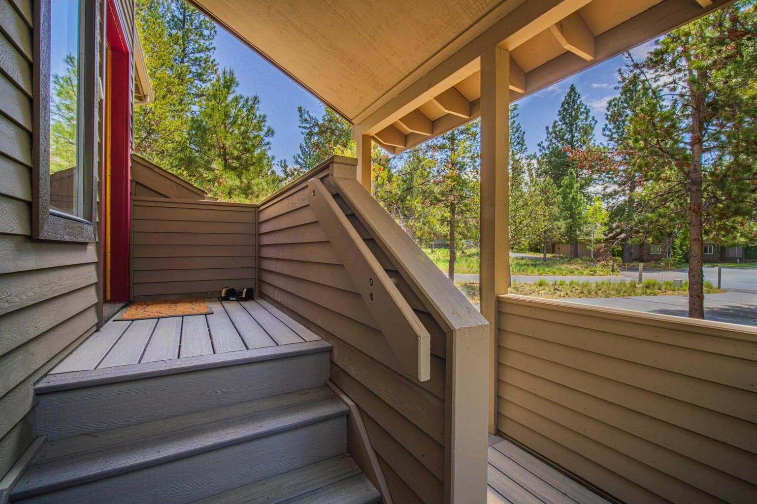 Updated Trex entry decking creates a durable and inviting first impression.