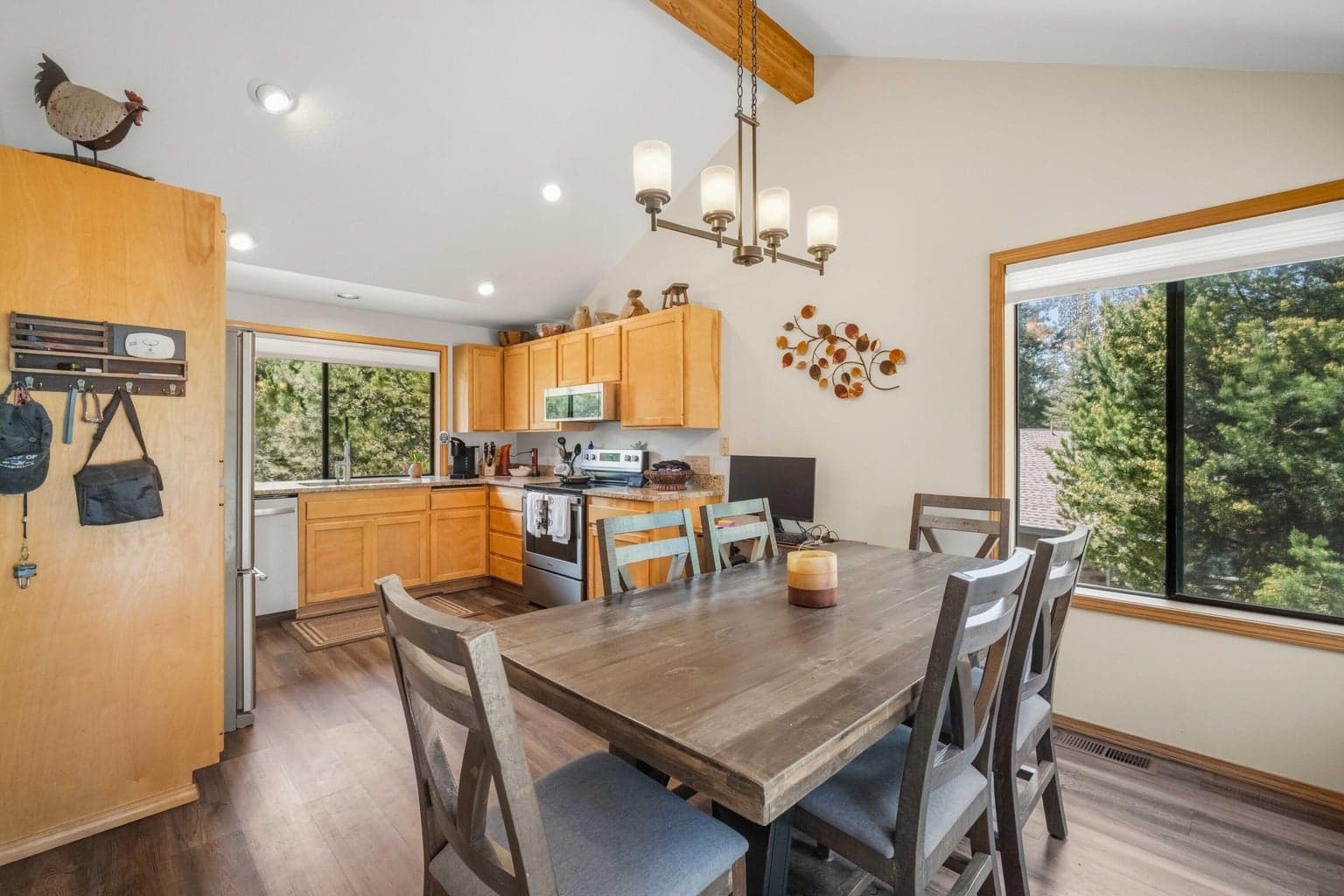 Dining space near the sliding door for easy indoor-outdoor living.