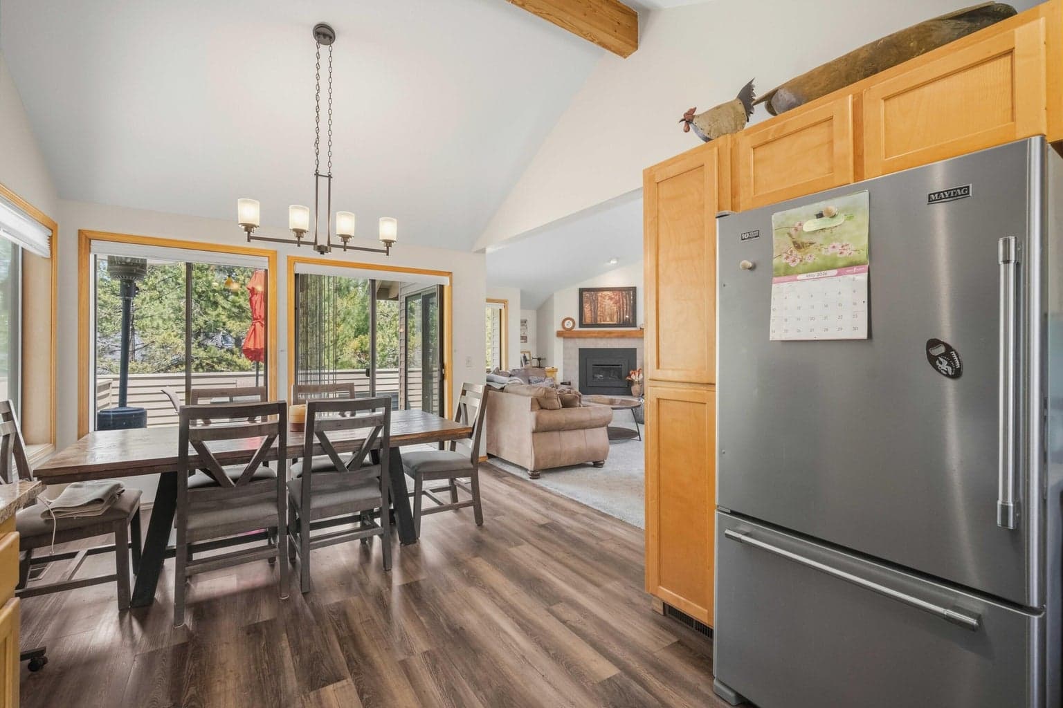 Kitchen and dining area open toward the great room for an easy everyday layout.